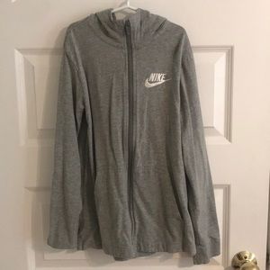 Unisex Nike kids zip up hoodie.